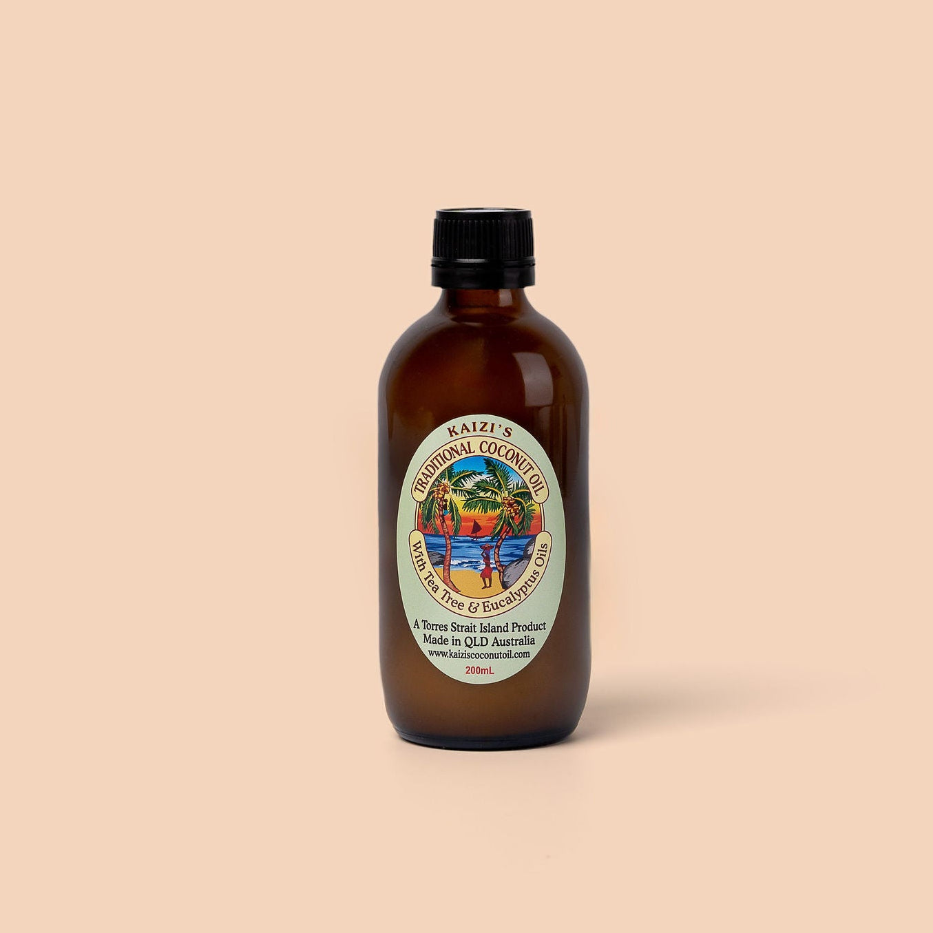 Brown bottle of coconut oil with a label on a beige background