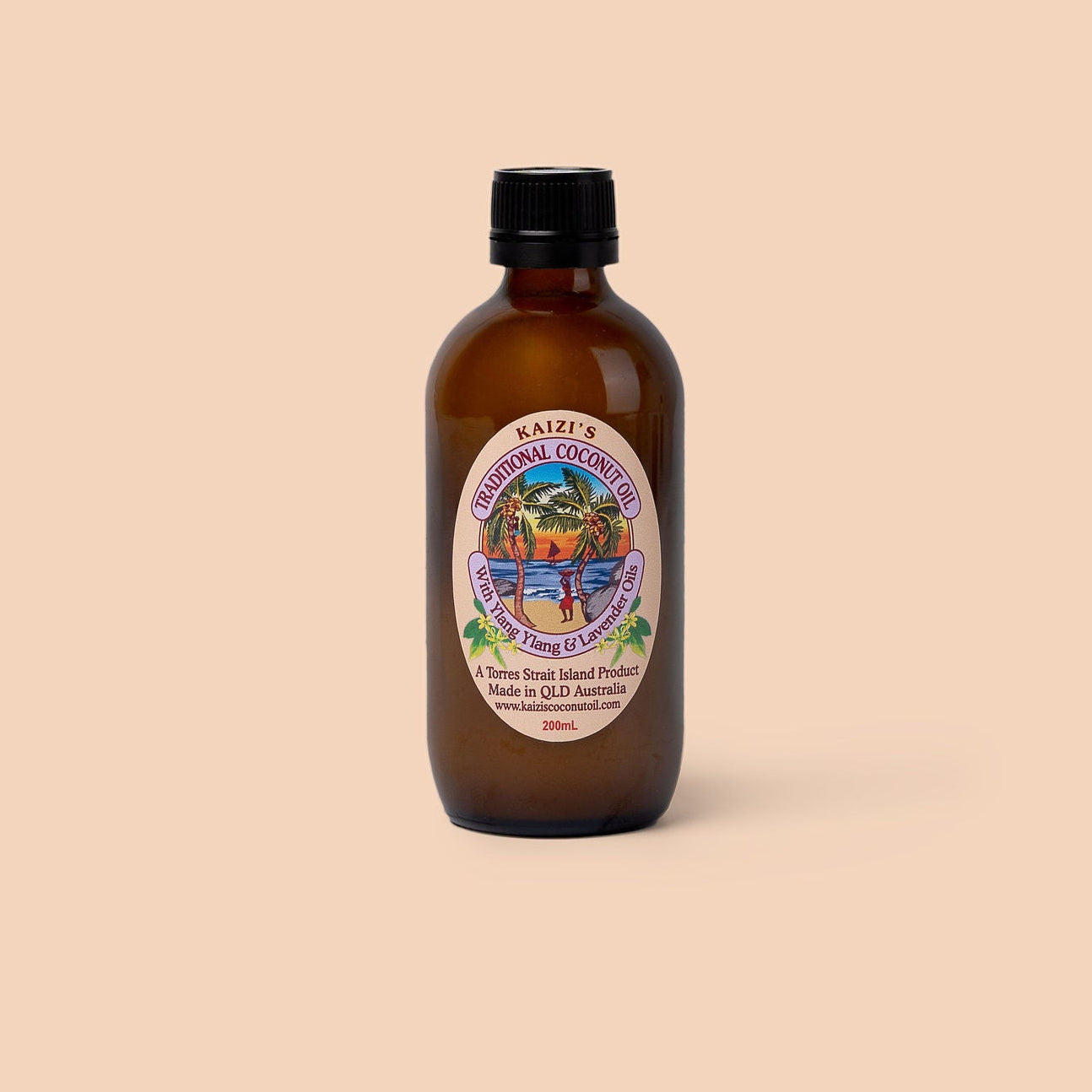 Brown bottle of coconut oil with a label on a beige background